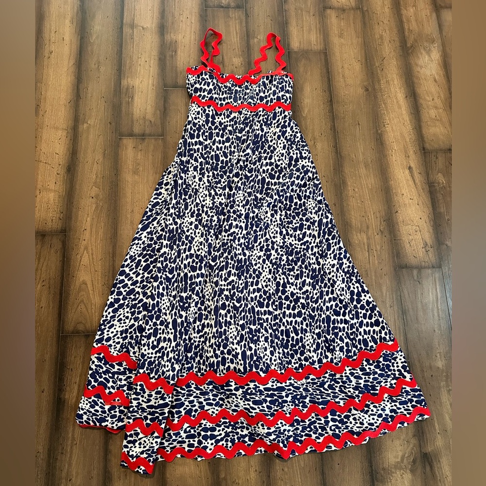 NWOT beautiful summer dress. Navy and white pattern with red accent and straps.